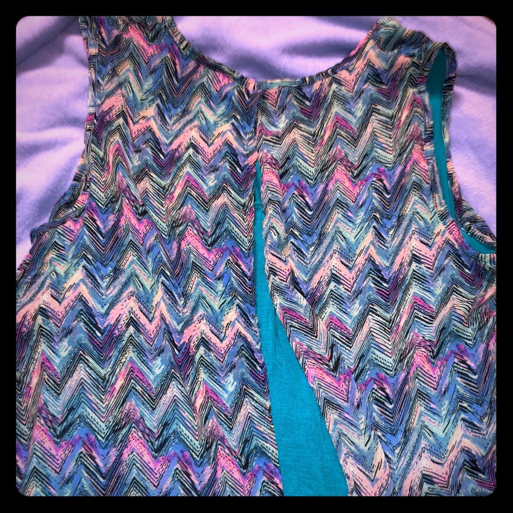 Colorful loose tank top flows freely overlay